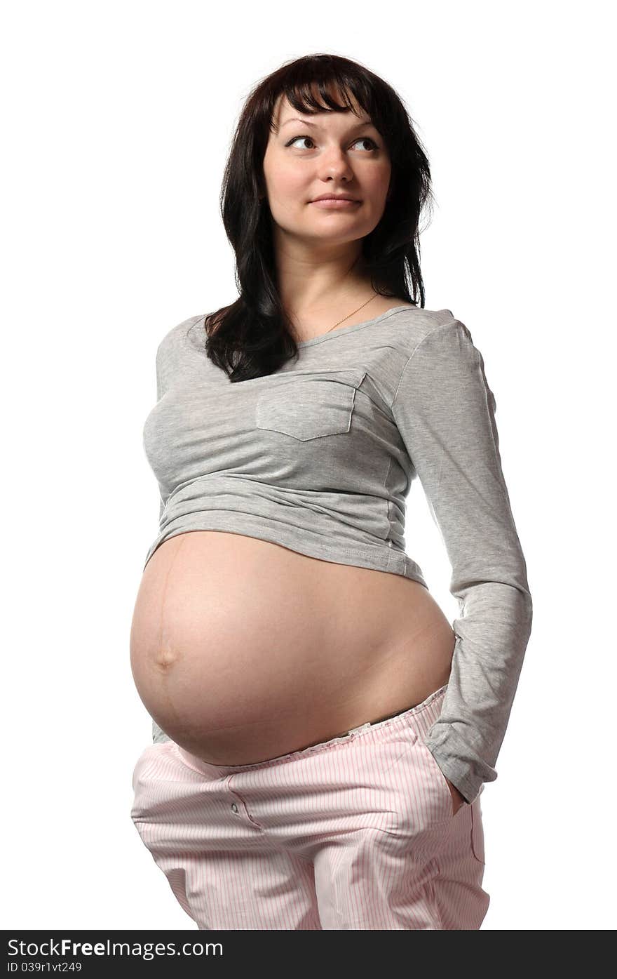 Pregnant young woman in studio. Pregnant young woman in studio