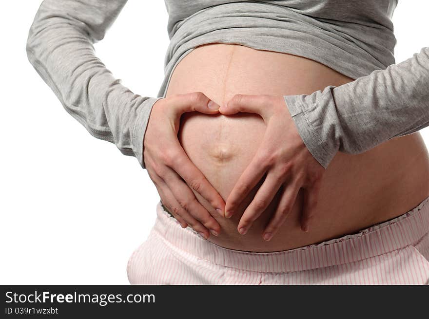 Pregnant young woman in studio. Pregnant young woman in studio