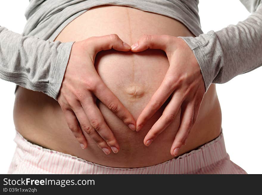 Pregnant young woman in studio. Pregnant young woman in studio