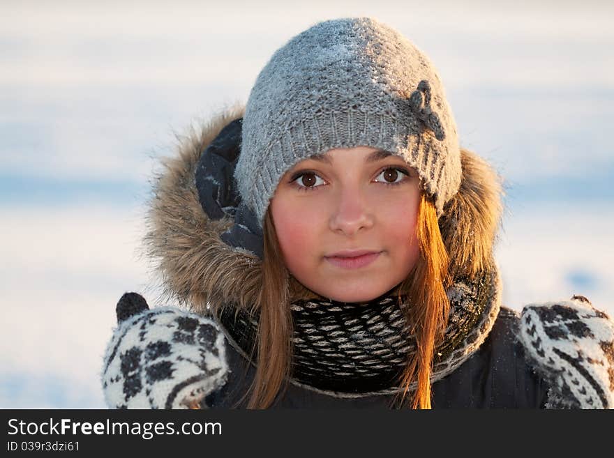 Portrait of a young beautiful girl in the cold. Portrait of a young beautiful girl in the cold