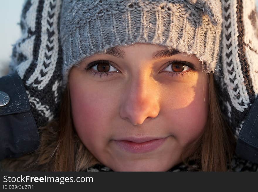 Portrait of a beautiful girl close up in winter. Portrait of a beautiful girl close up in winter