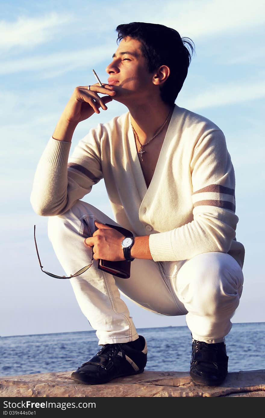 Young man near the water