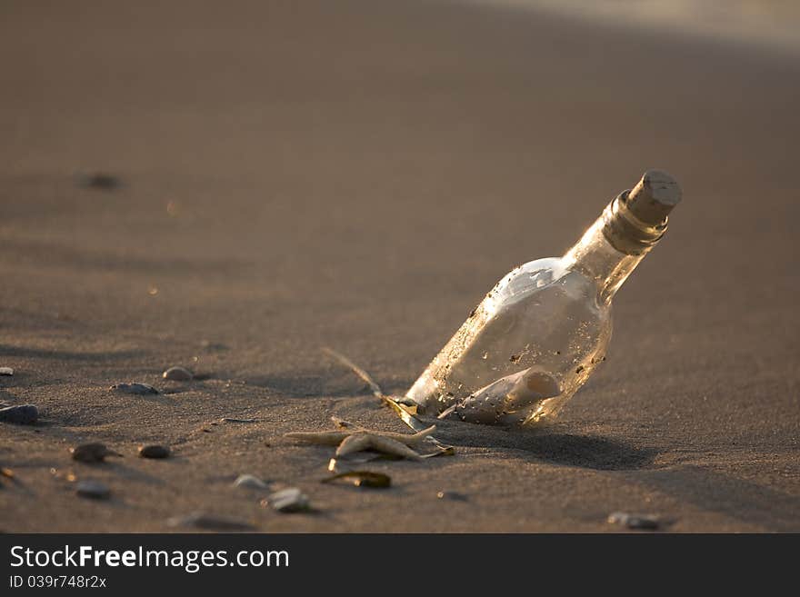 A message in the bottle on sand