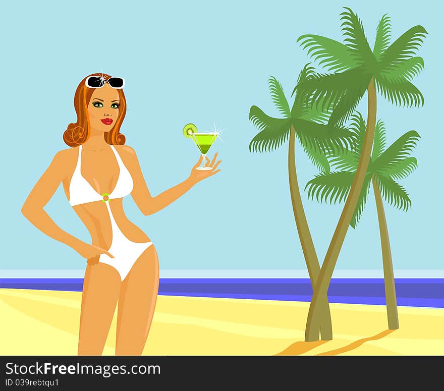 Girl with a cocktail on the beach