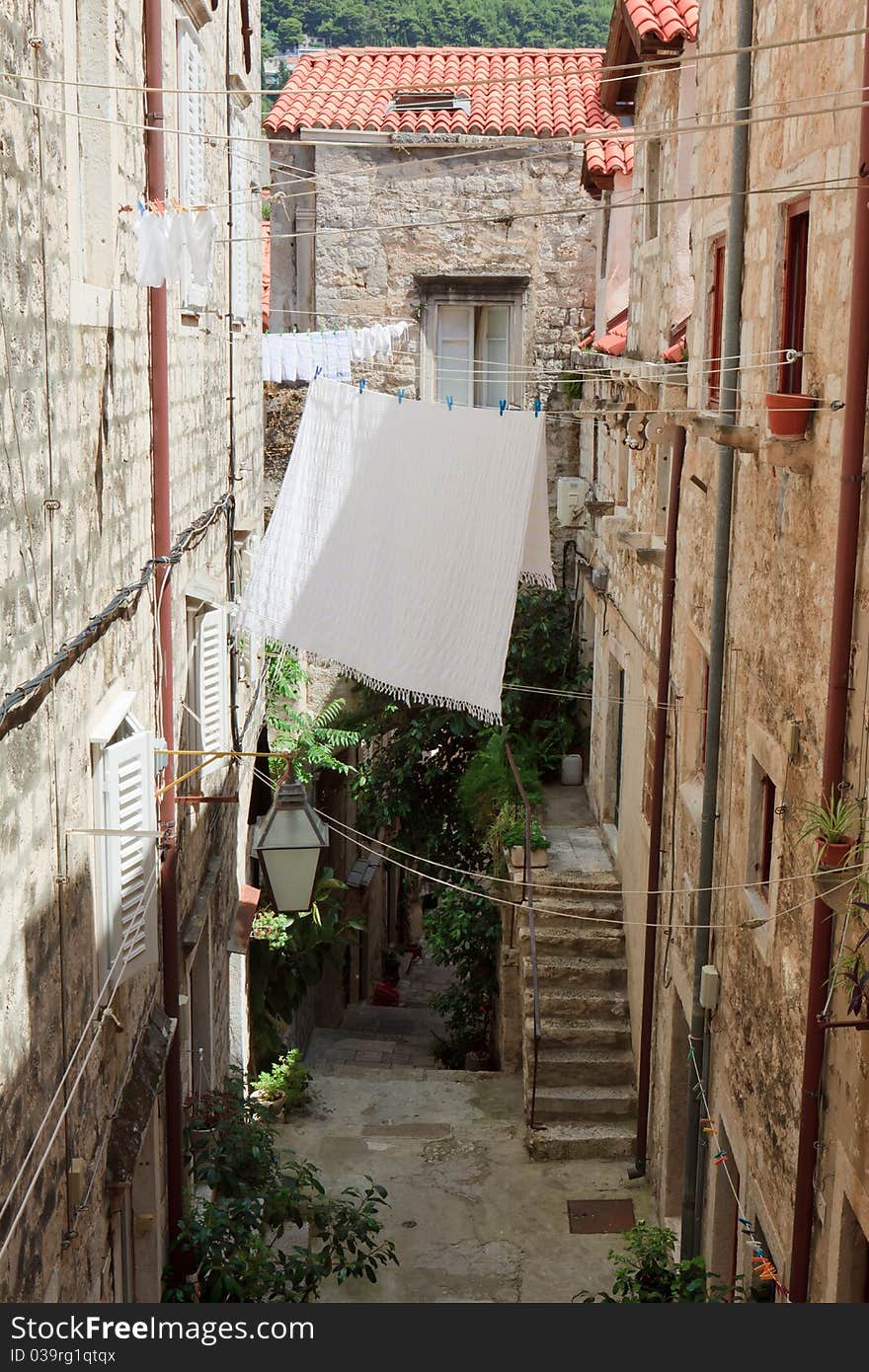 Alley with laundry hanging on a line