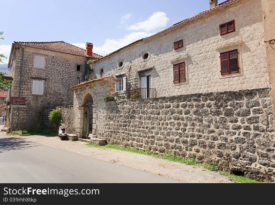 Old stone house with round windows