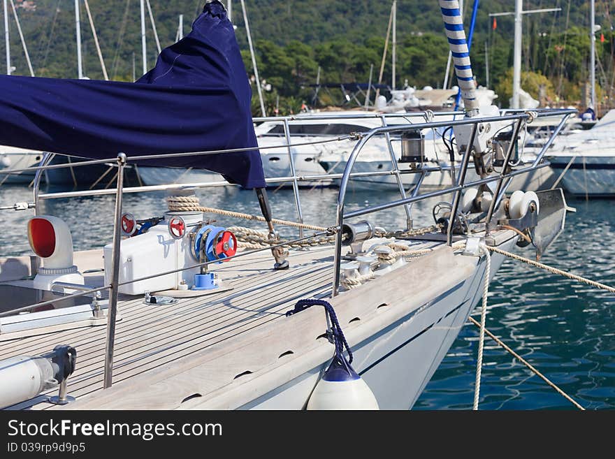 Chrome and teak boat bow at dock in Montenegro