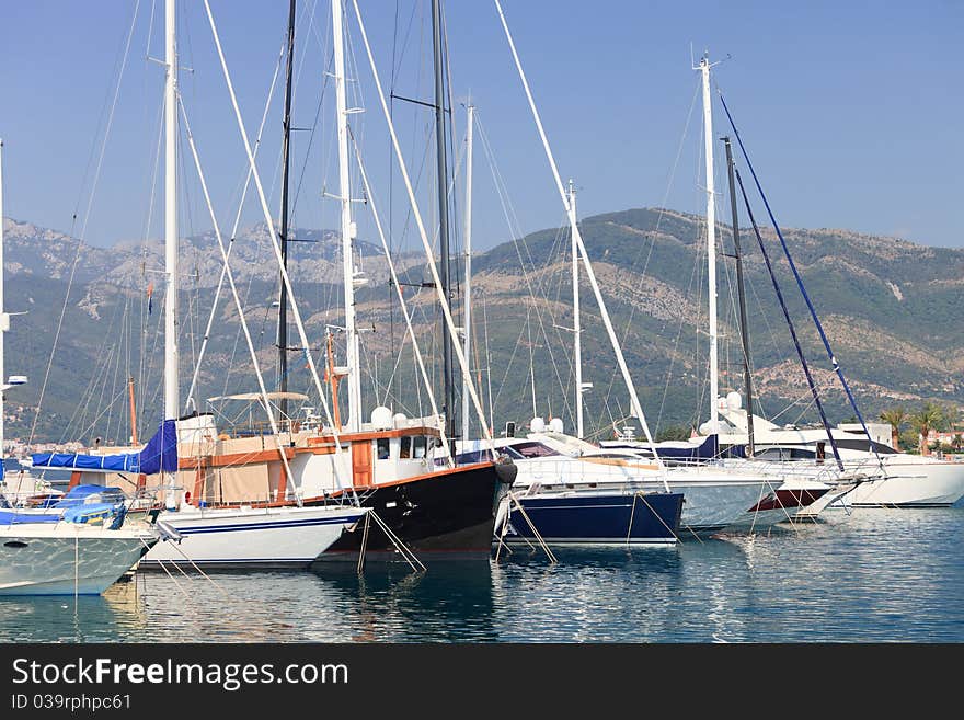 Sailboats at dock in Montenegro in the summer