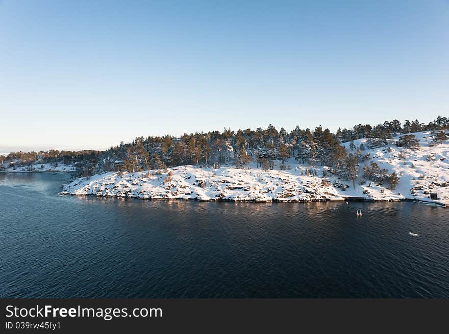 Iced sea and land in polar region