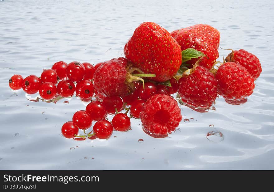 Fresh ripe berries on the water