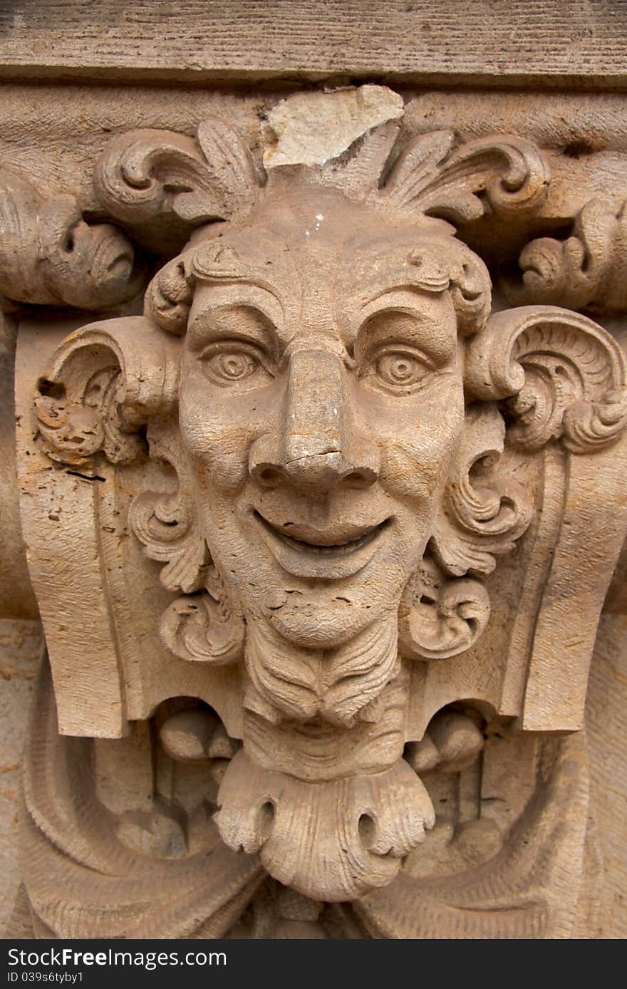 Close-up of one of the numerous sculptured mythological figures on the Wallpavillion of the Zwinger Palace, Dresden. Close-up of one of the numerous sculptured mythological figures on the Wallpavillion of the Zwinger Palace, Dresden