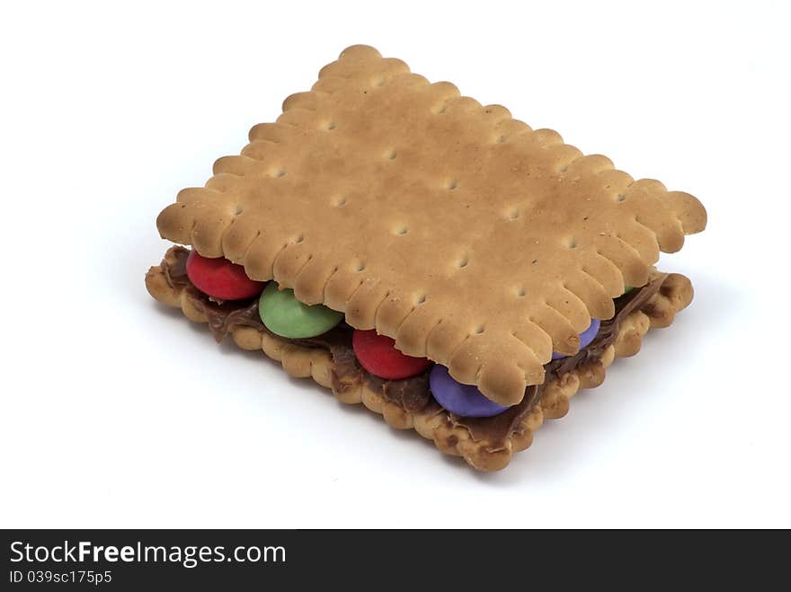 Small candy with chocolate cream sandwich, with bisquit, on white background. Small candy with chocolate cream sandwich, with bisquit, on white background