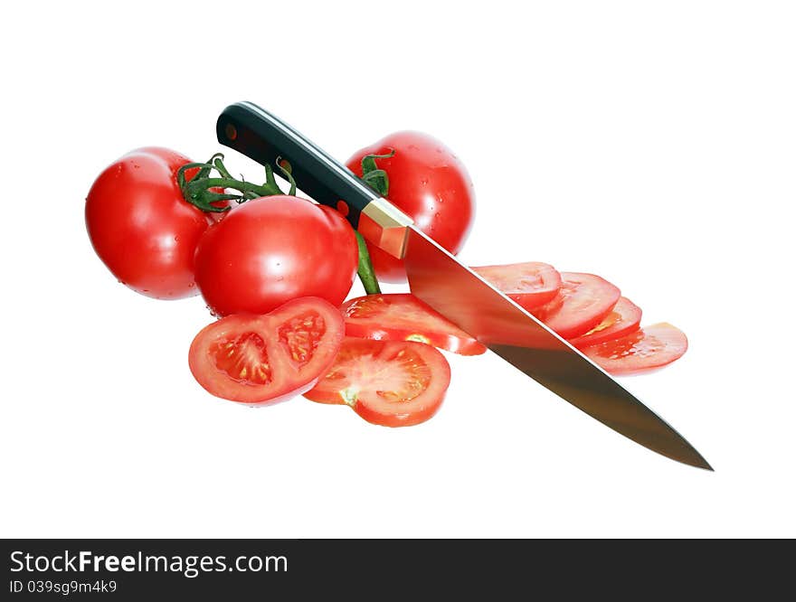 Sliced Tomatoes And Knife