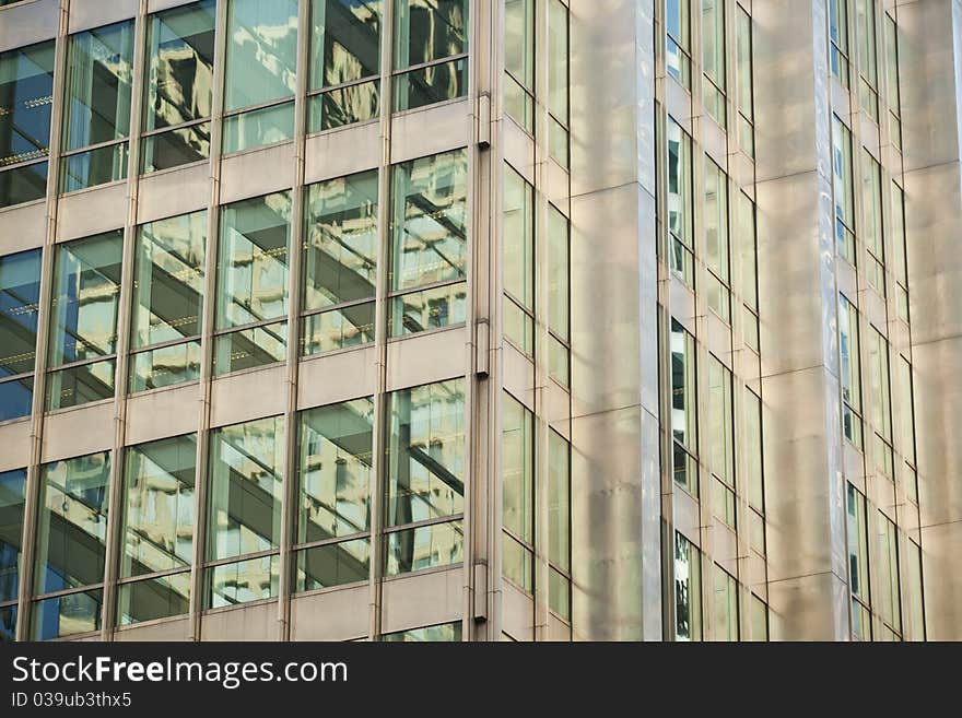 Detail of a modern steel and glass office building. Detail of a modern steel and glass office building