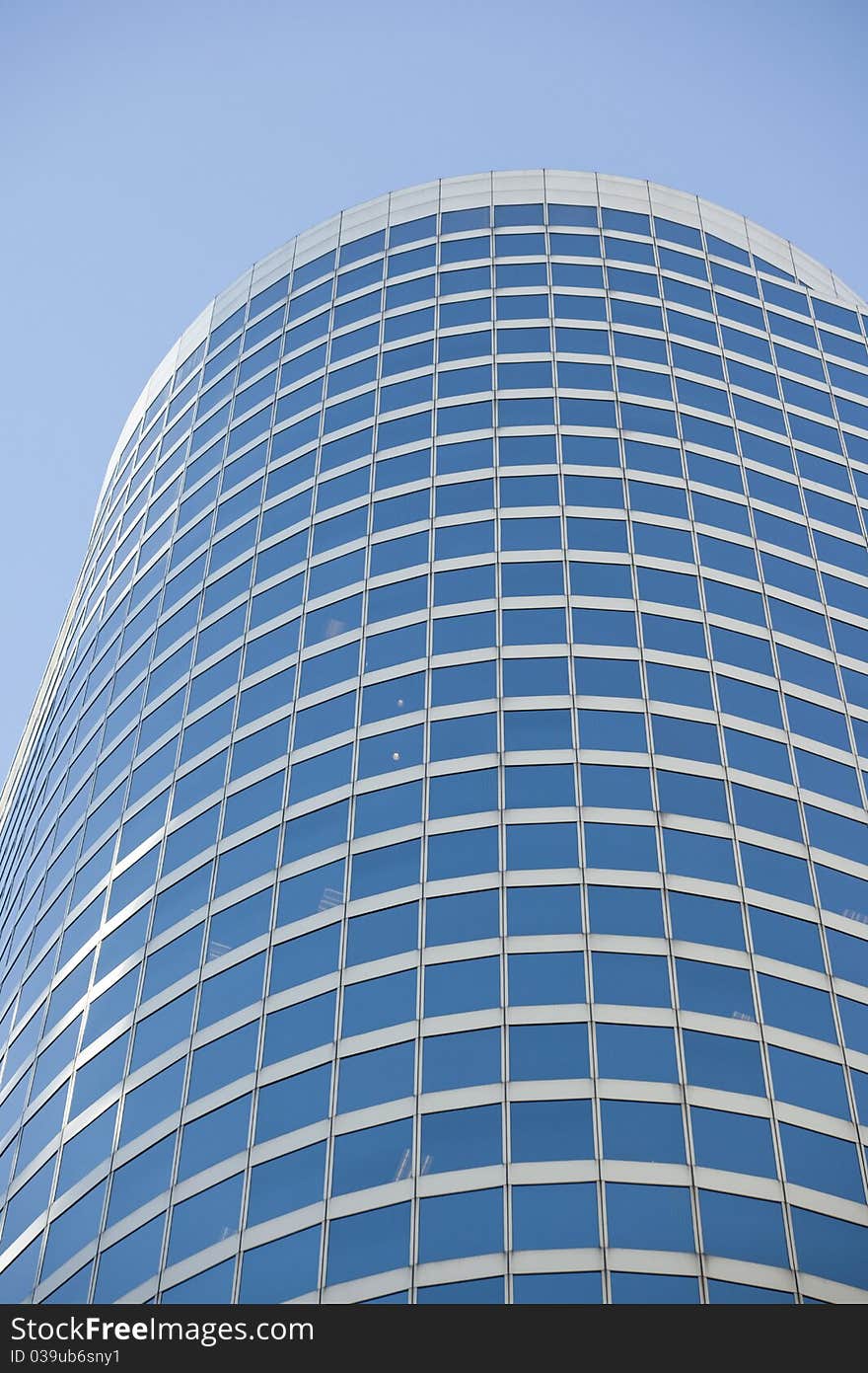 Detail of a modern steel and glass office building. Detail of a modern steel and glass office building