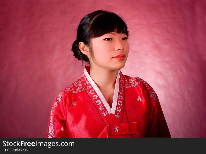 Elegant chinese model in traditional red dress