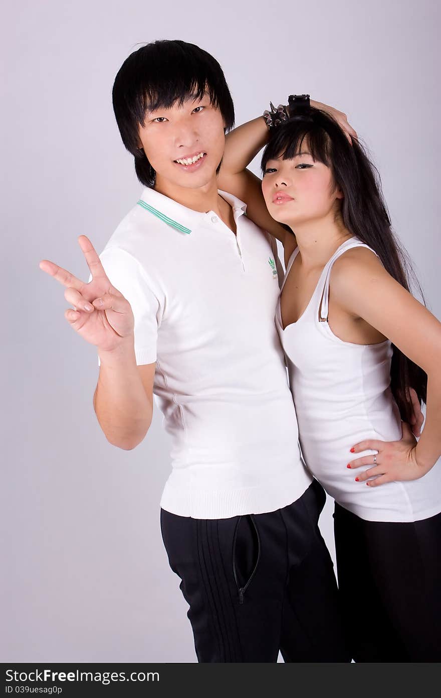 Beautiful asian loving couple in a studio.