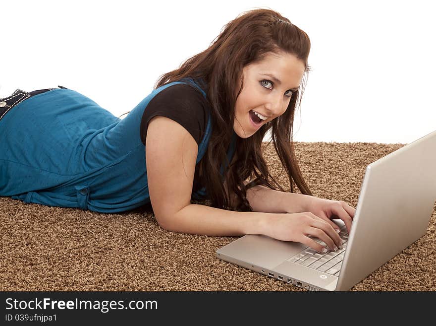 Woman floor laptop happy