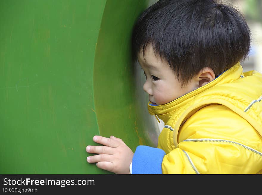 A cute baby is playing. A cute baby is playing