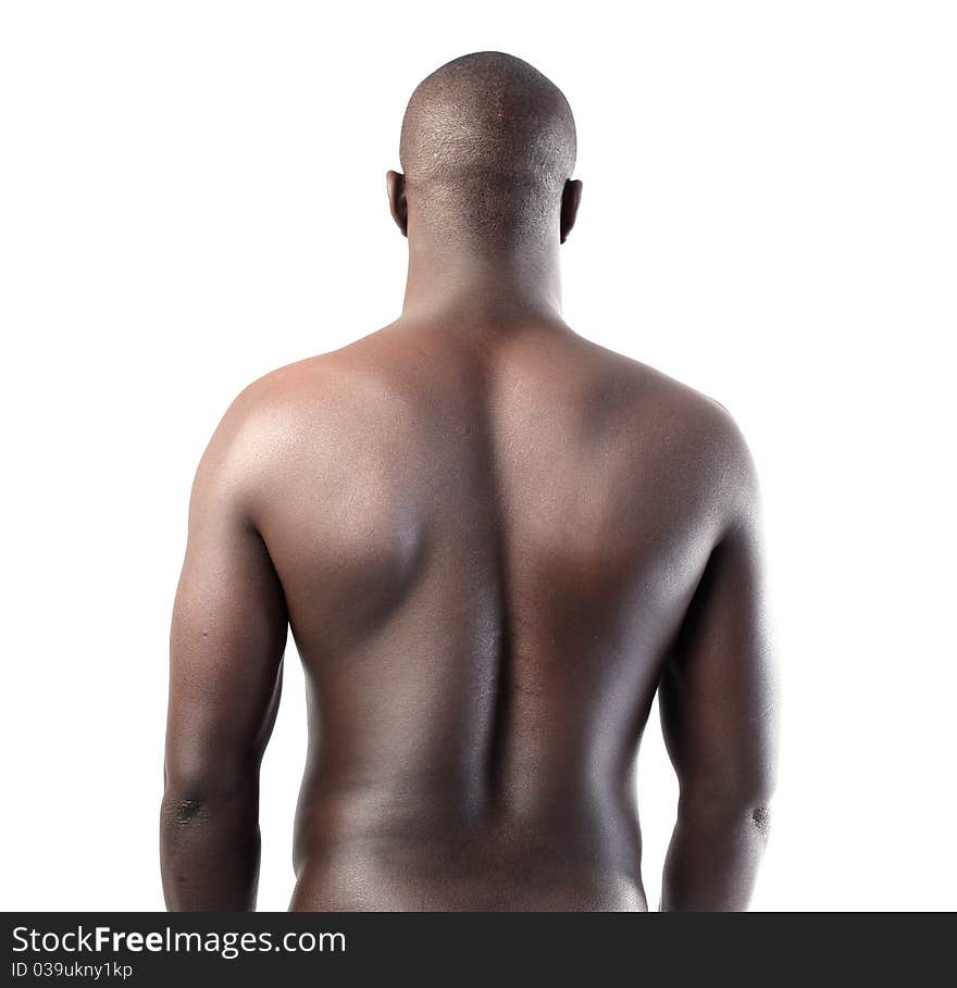 Rear view of a handsome african man showing his muscles. Rear view of a handsome african man showing his muscles