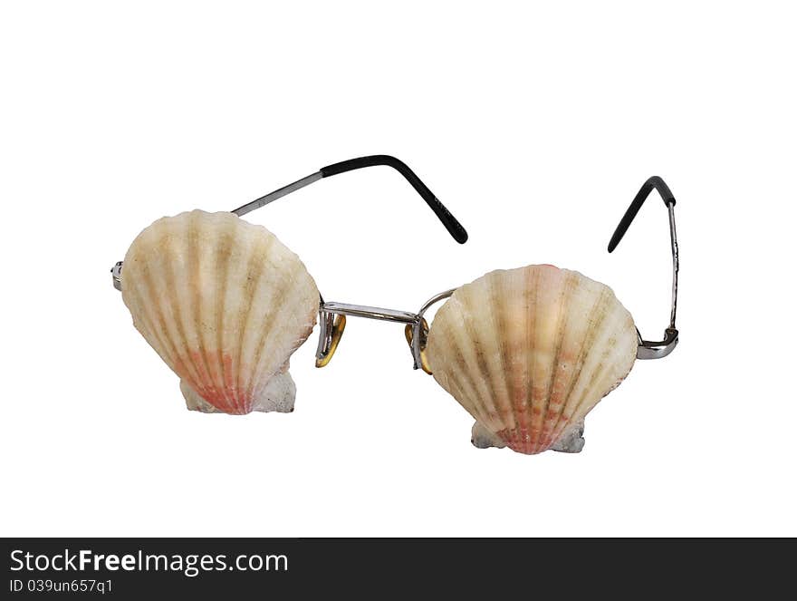 Glasses with seashells instead of glasses, a white background. Glasses with seashells instead of glasses, a white background