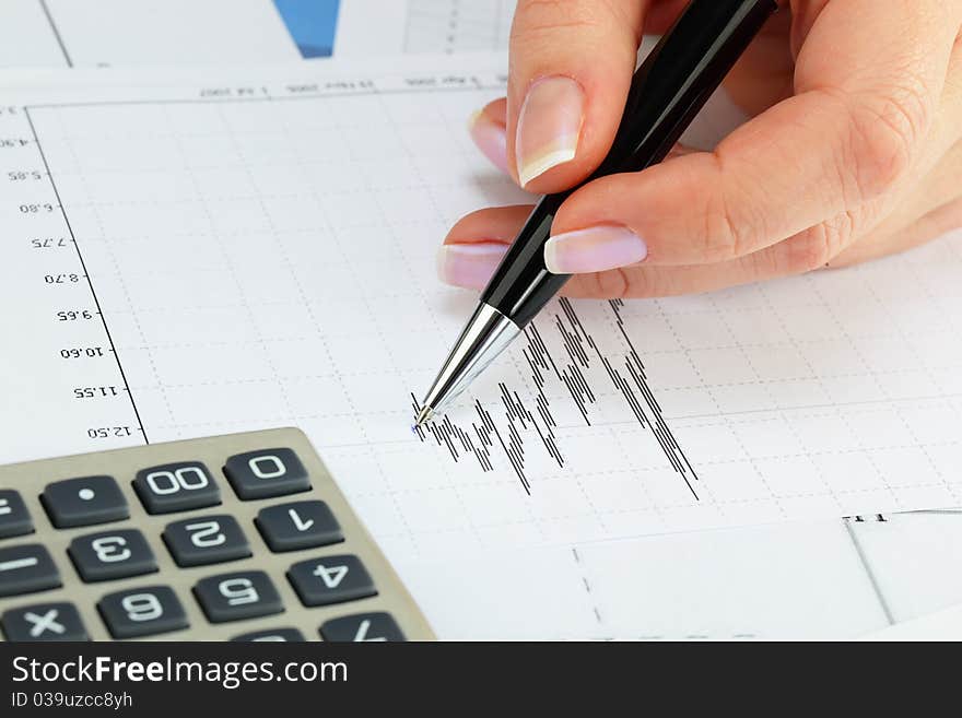 Financial charts and graphs on the table