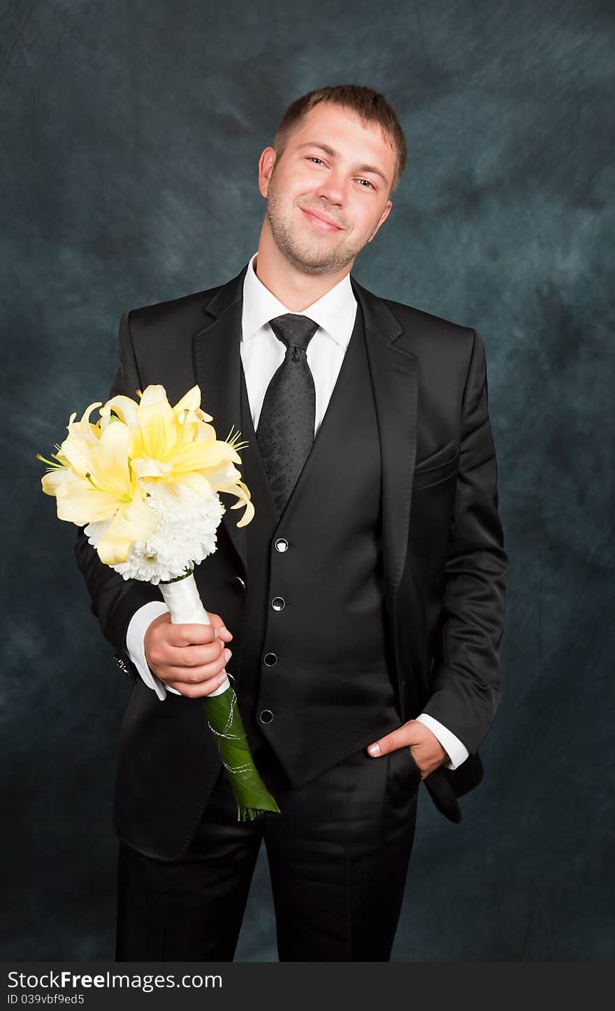 Groom with a bouquet