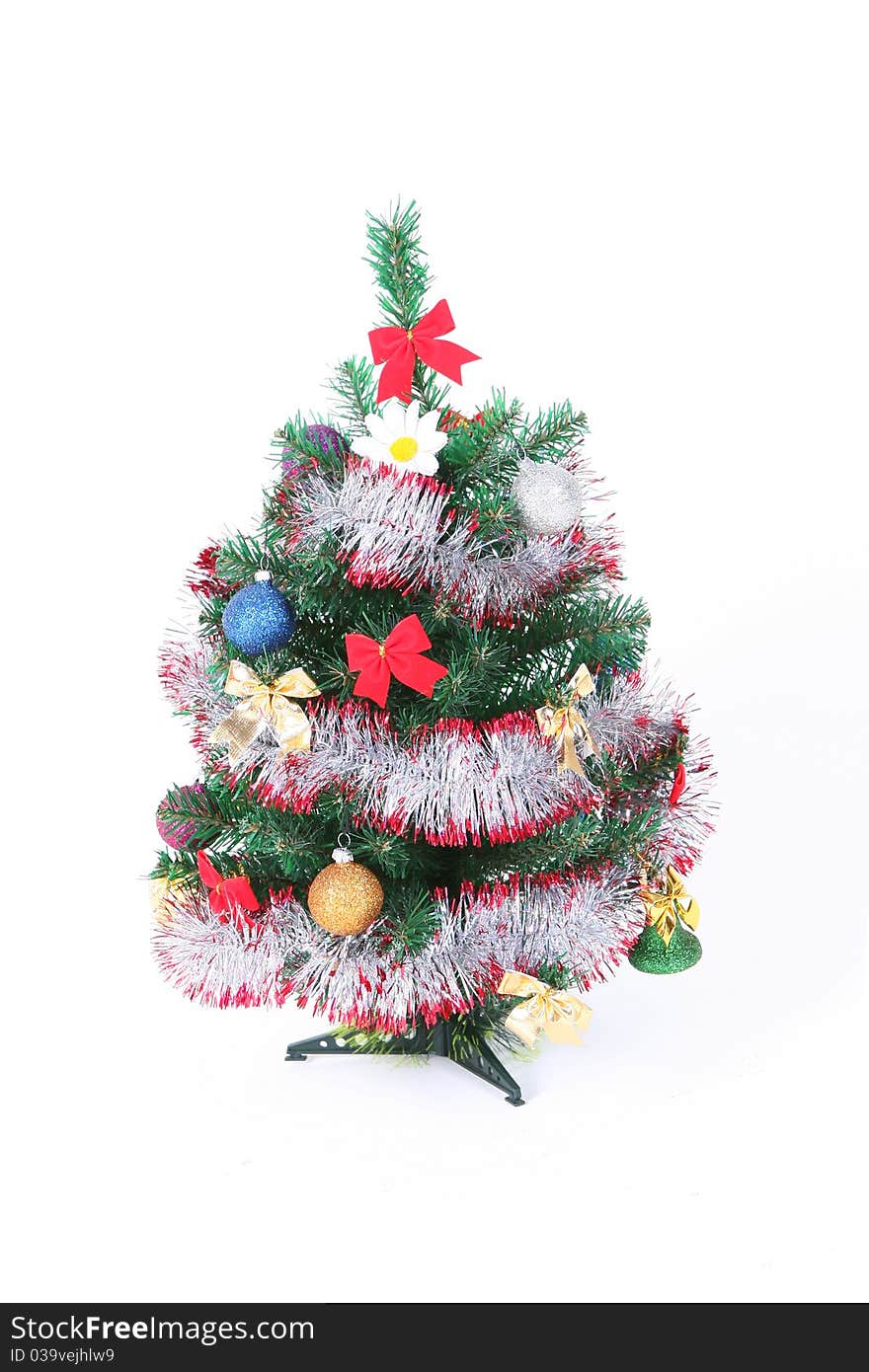 Christmas tree with toys on a white background.