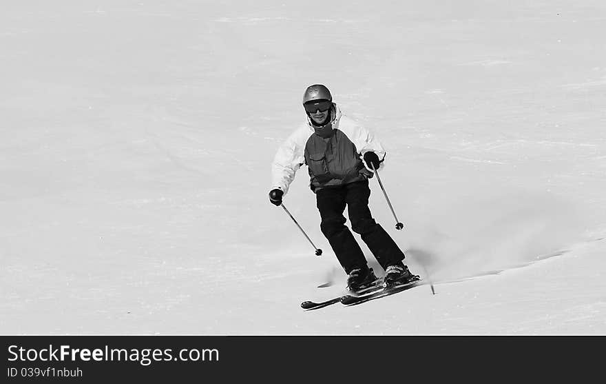 Smiling skier on the slope