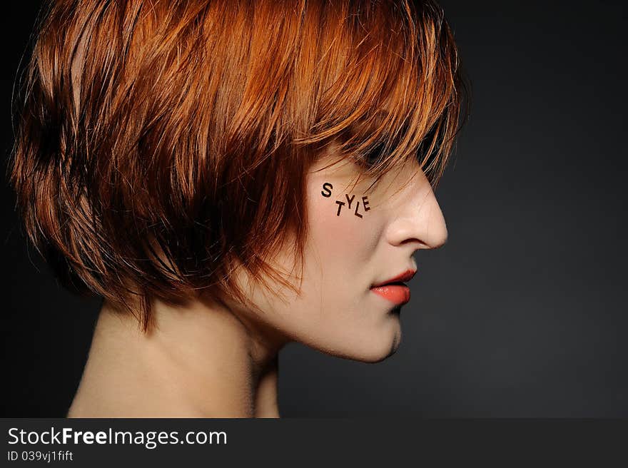 Style.Beautiful woman portrait with fashion hairstyle and creative trendy make-up. Style.Beautiful woman portrait with fashion hairstyle and creative trendy make-up