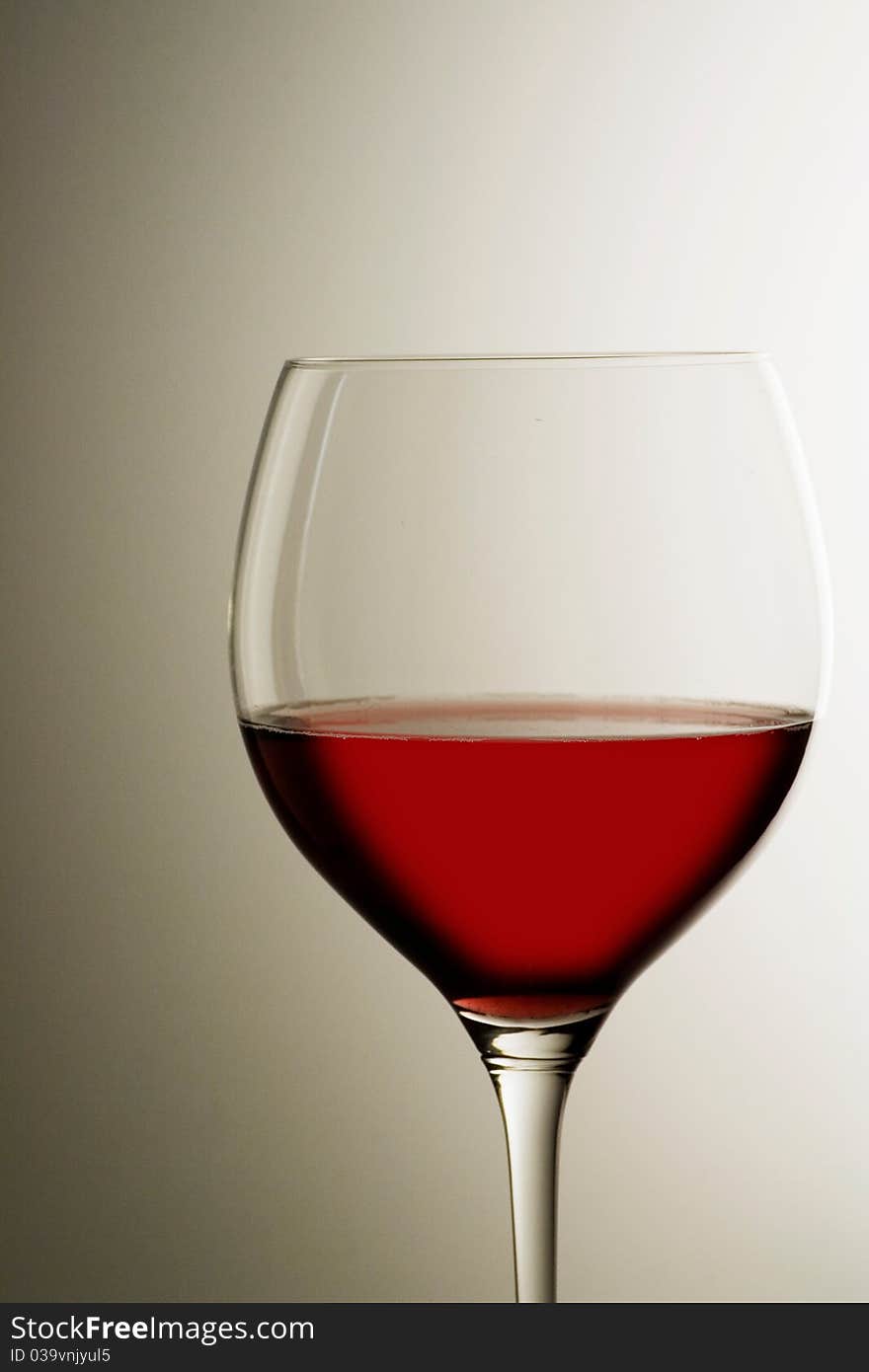 A wine glass on a background