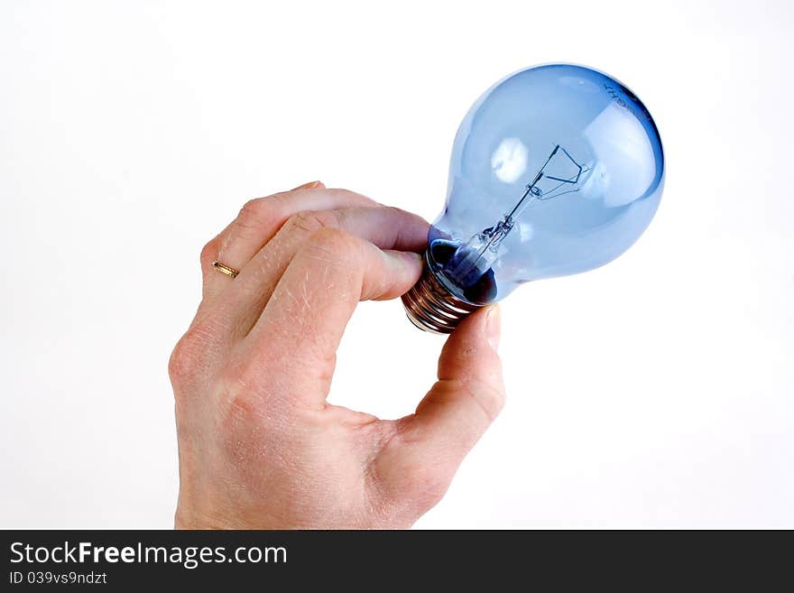 Photo from a hand holding a daylight light bulb. Isolated white background.