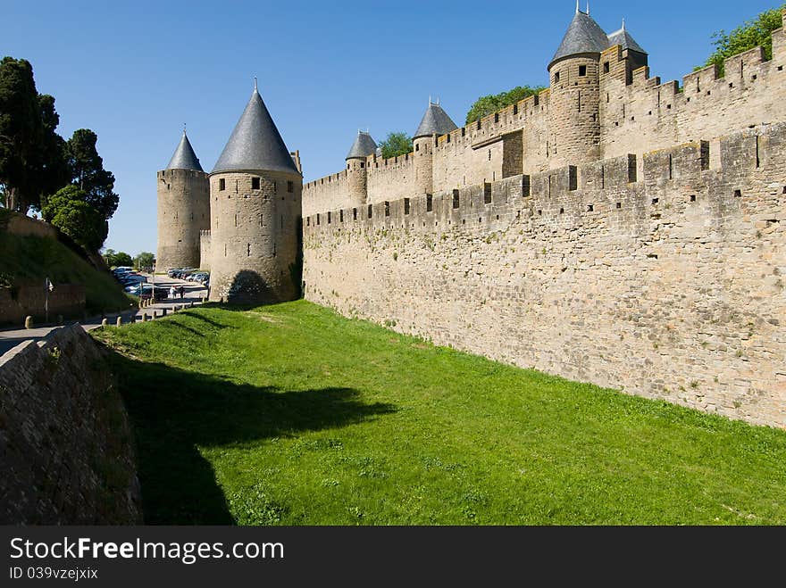 Carcassone is a fortified chateau in Aude south france. This showed tower,stone wall and moat. Carcassone is a fortified chateau in Aude south france. This showed tower,stone wall and moat.