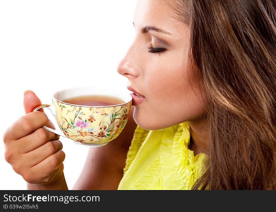 Woman with fresh cup of tea