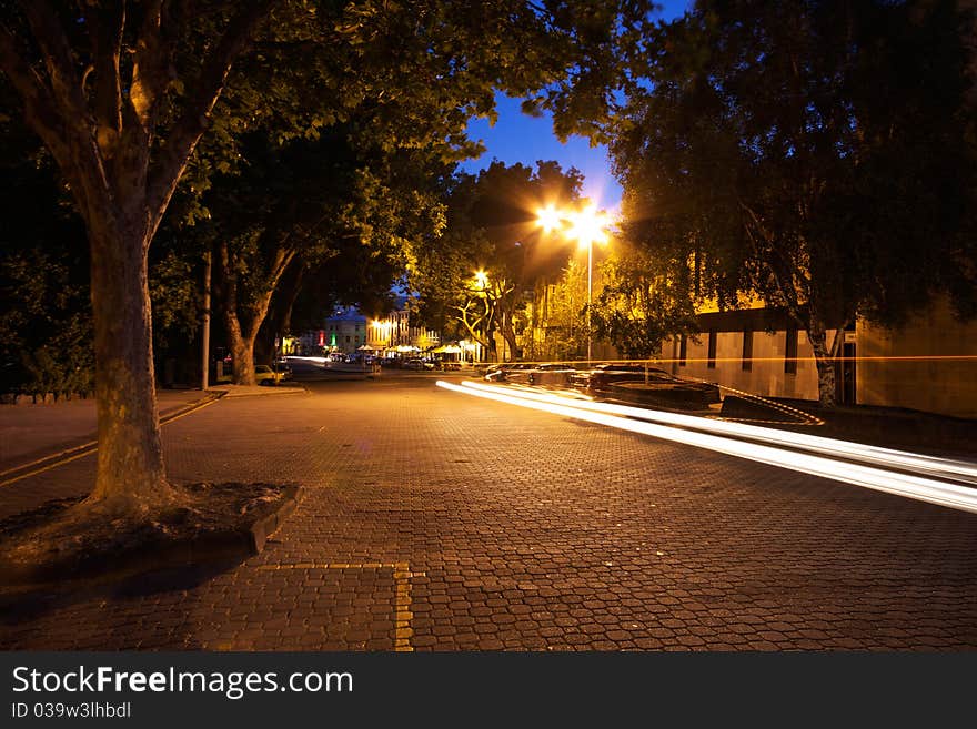 A night scene at Salamanca Place in Hobart, Tasmania. The white lights are trails from a car's headlights. A night scene at Salamanca Place in Hobart, Tasmania. The white lights are trails from a car's headlights.