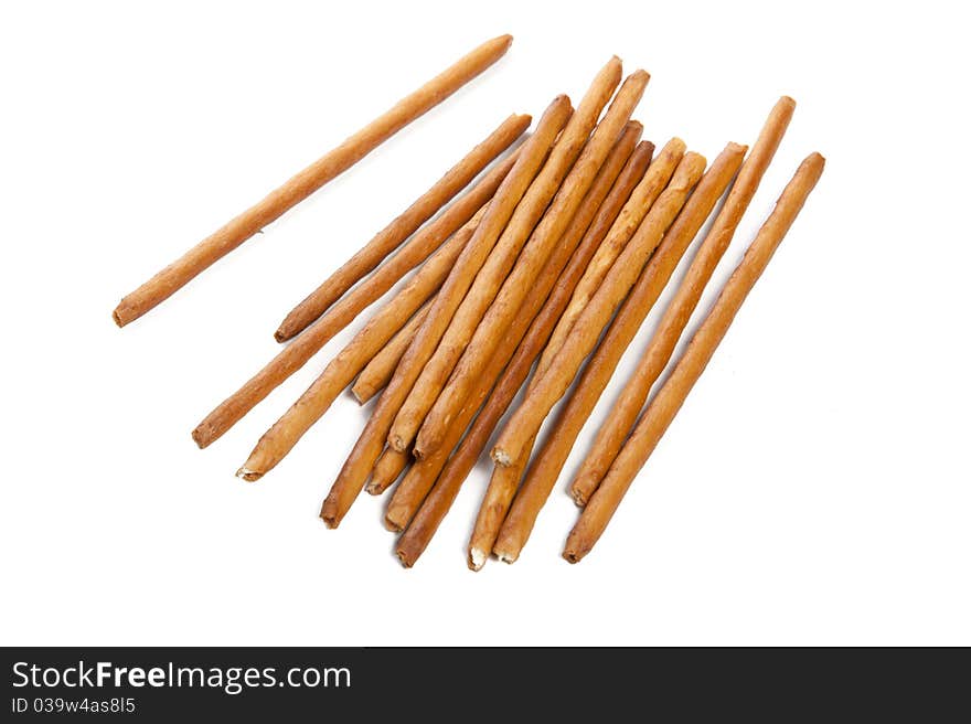 Bread-straw is on a white background. Closeup.