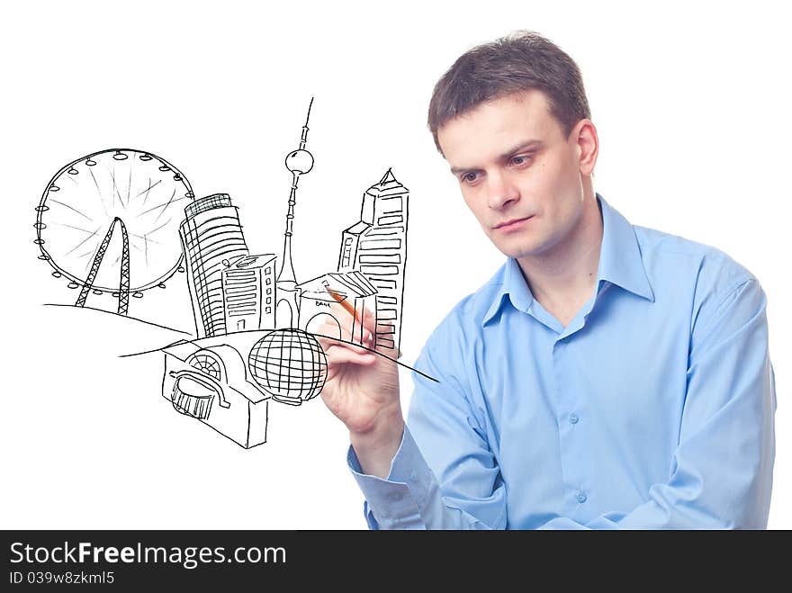 Businessman drawing a city of the future on white background