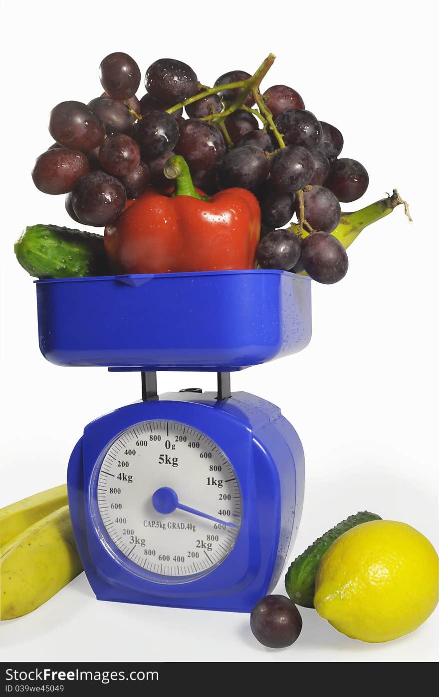 Fruit And Vegetables On Scales