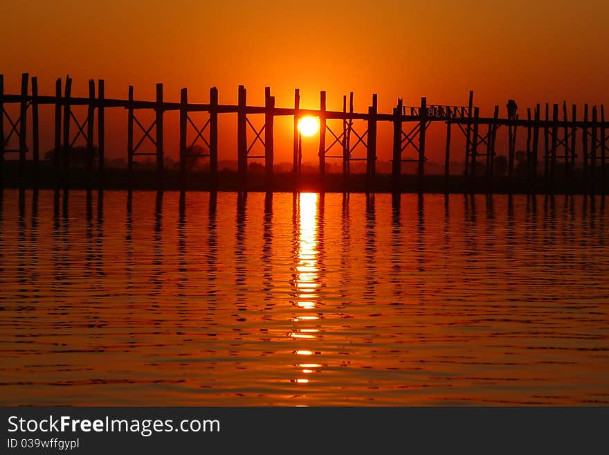 Landscape of an old wooden bridge at sunset. Landscape of an old wooden bridge at sunset