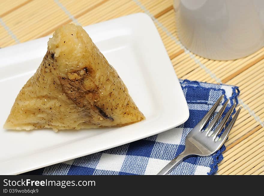 Cooked dumpling on plate for a snack or meal. Asian style traditional delicacy.