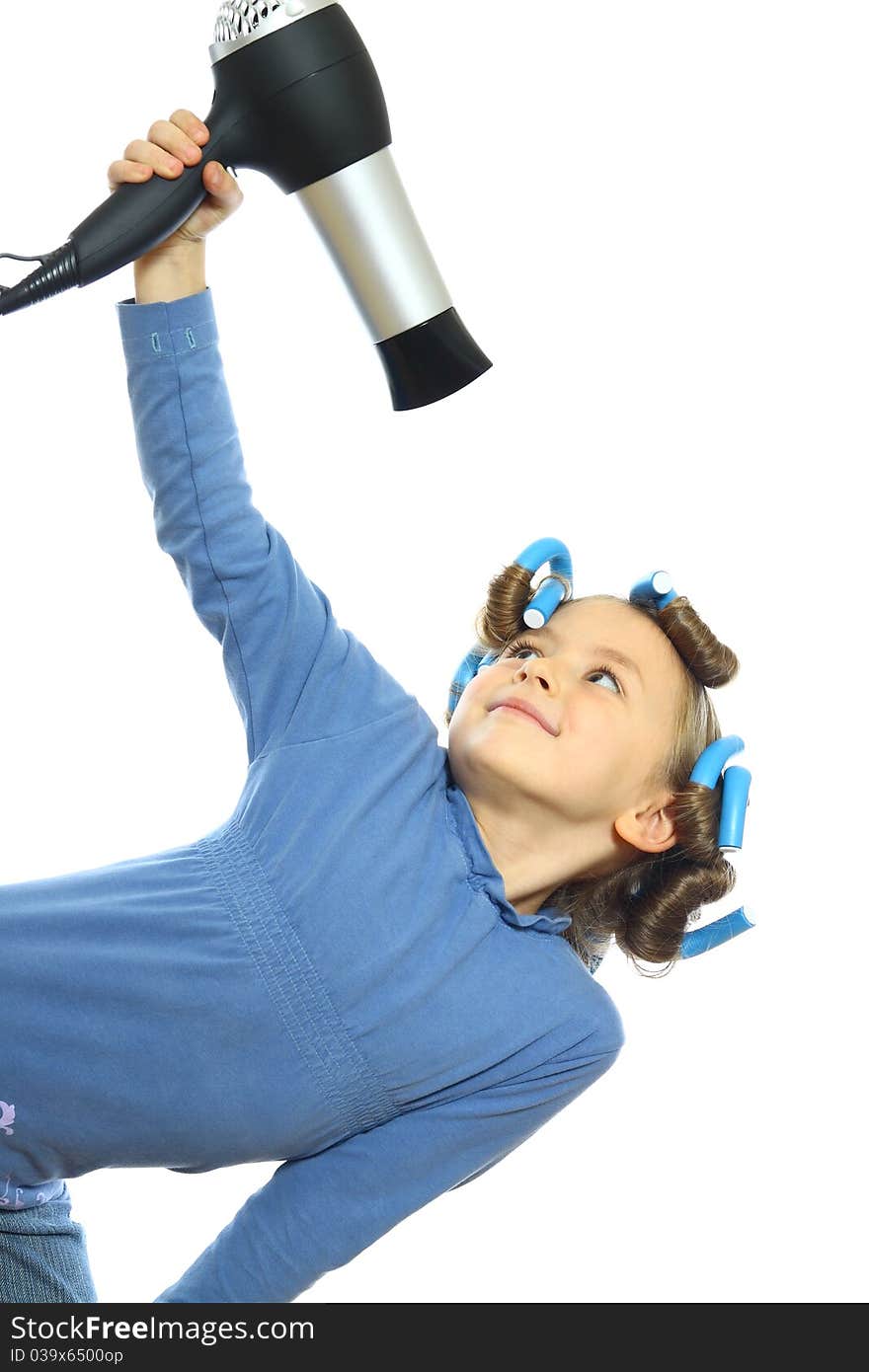 Little girl posing with hair dryer