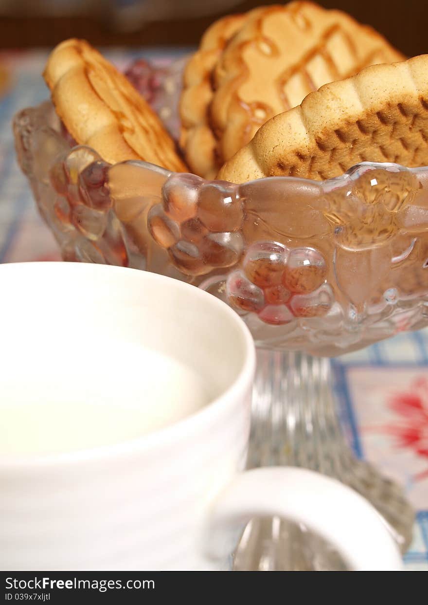 Milk and cookies on the table close-up