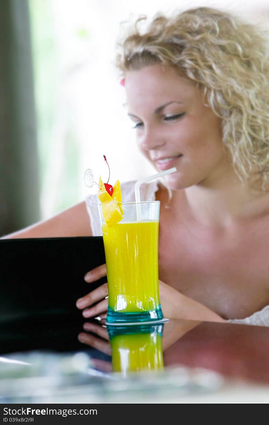 Young beautiful woman in cafe