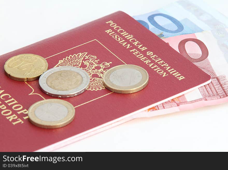 A Russian foreign passport with euro coins