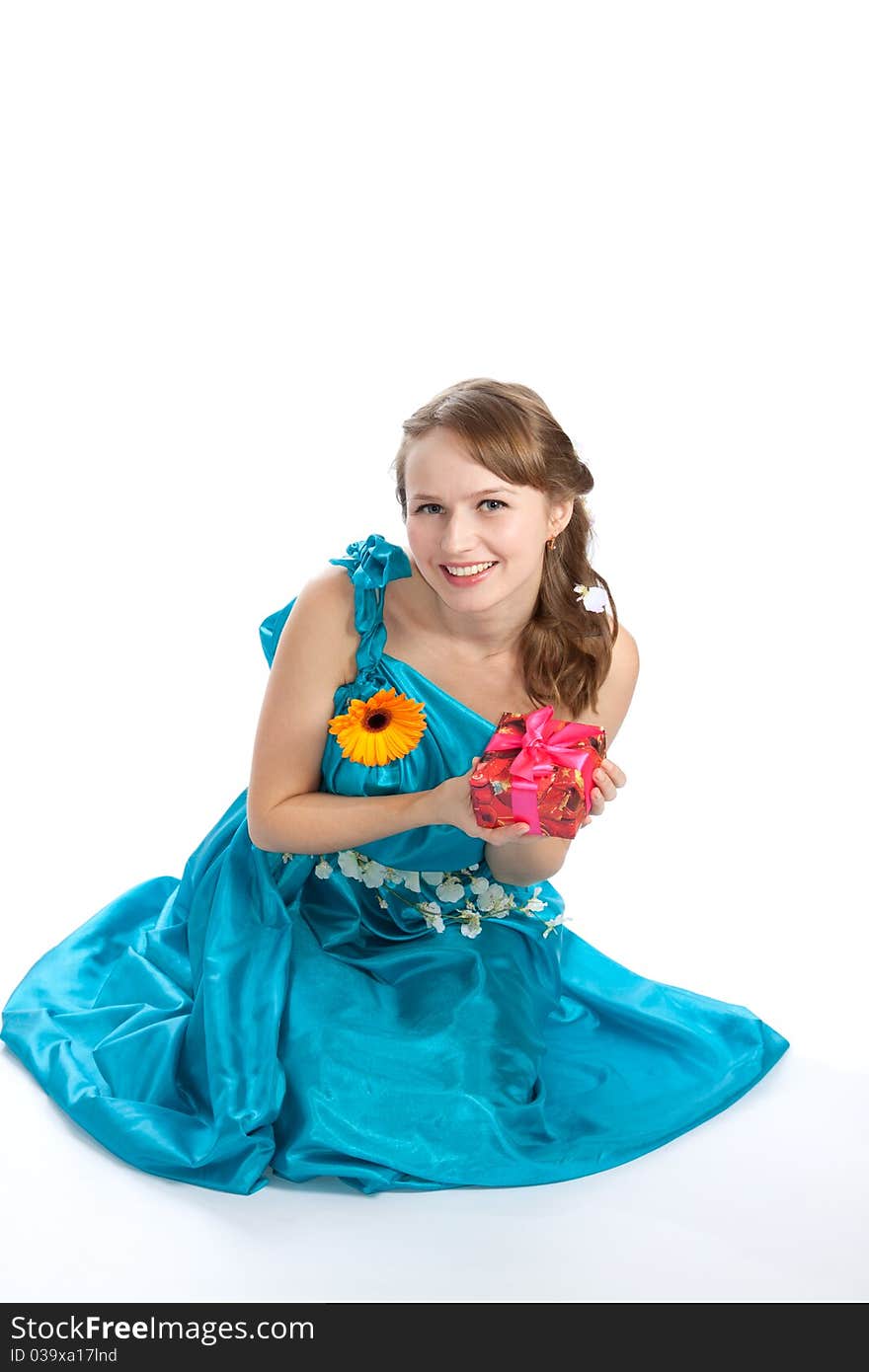 Young beautiful woman with flower and gift.