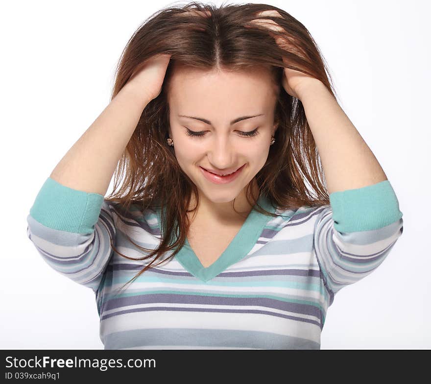 Portrait of young beautiful brunette girl in striped casual jumper