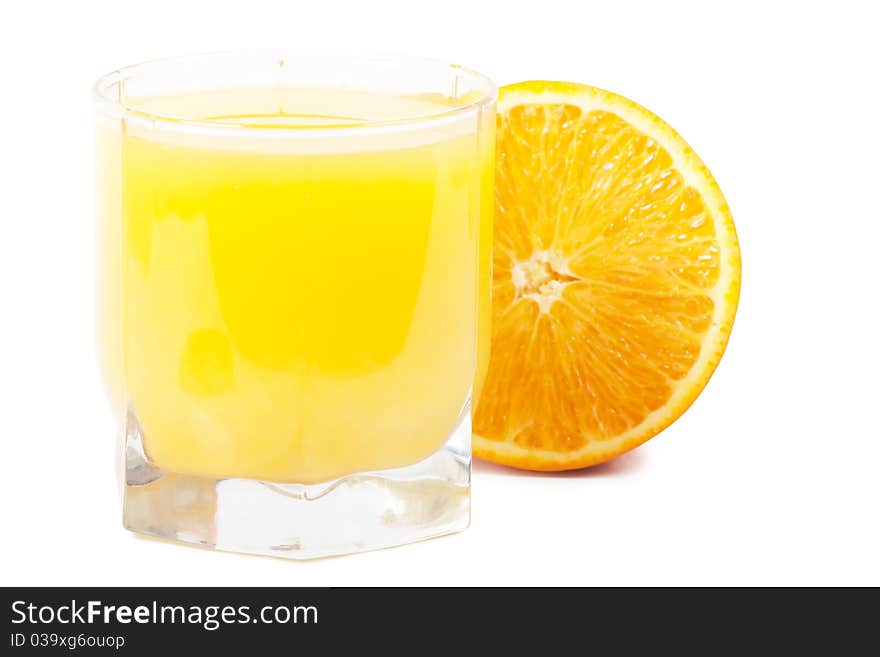 Orange and orange juice in glass