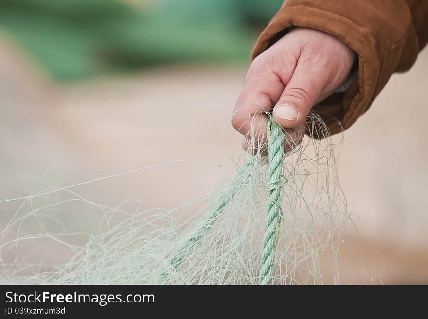 Hand holding fishing