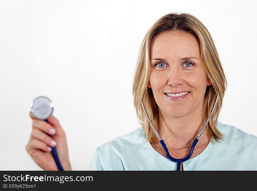 Beautiful blond nurse with stethoscope. Beautiful blond nurse with stethoscope