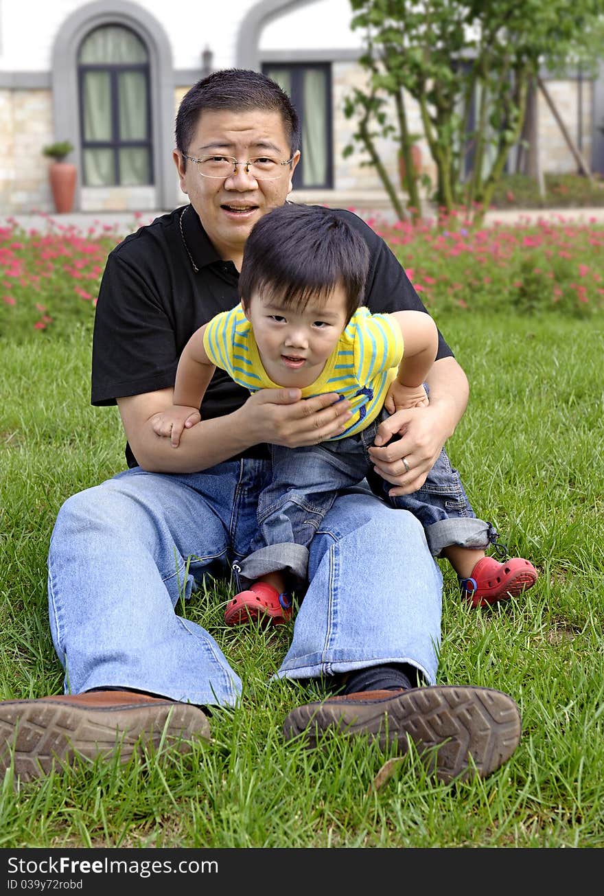 Baby playing with his father. Baby playing with his father